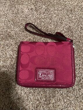 Coach Raspberry Pink  Signature Wristlet
Poppy collection 2010